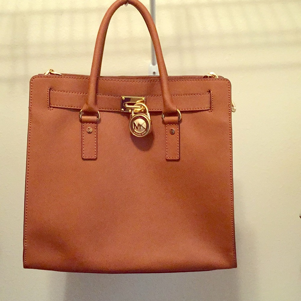Michael Kors purse with attached strap